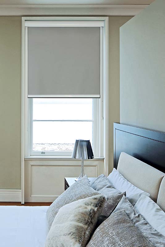 grey bloc blinds fitted to bedroom window