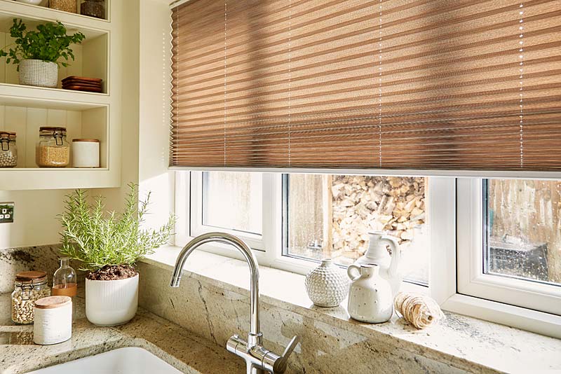 kitchen fitted with pleated blinds